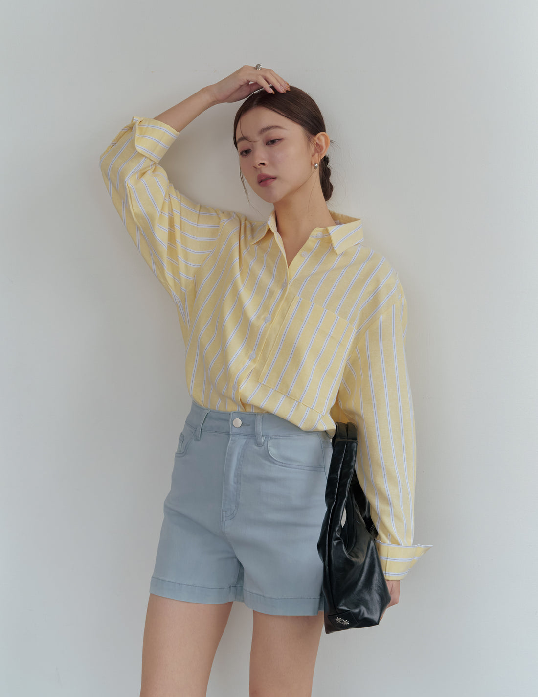 Emma Stretchy High Waisted Denim Shorts in Light Wash